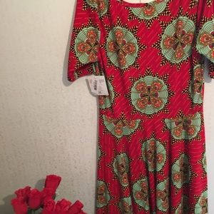 Lularoe dress with red, gold, green.